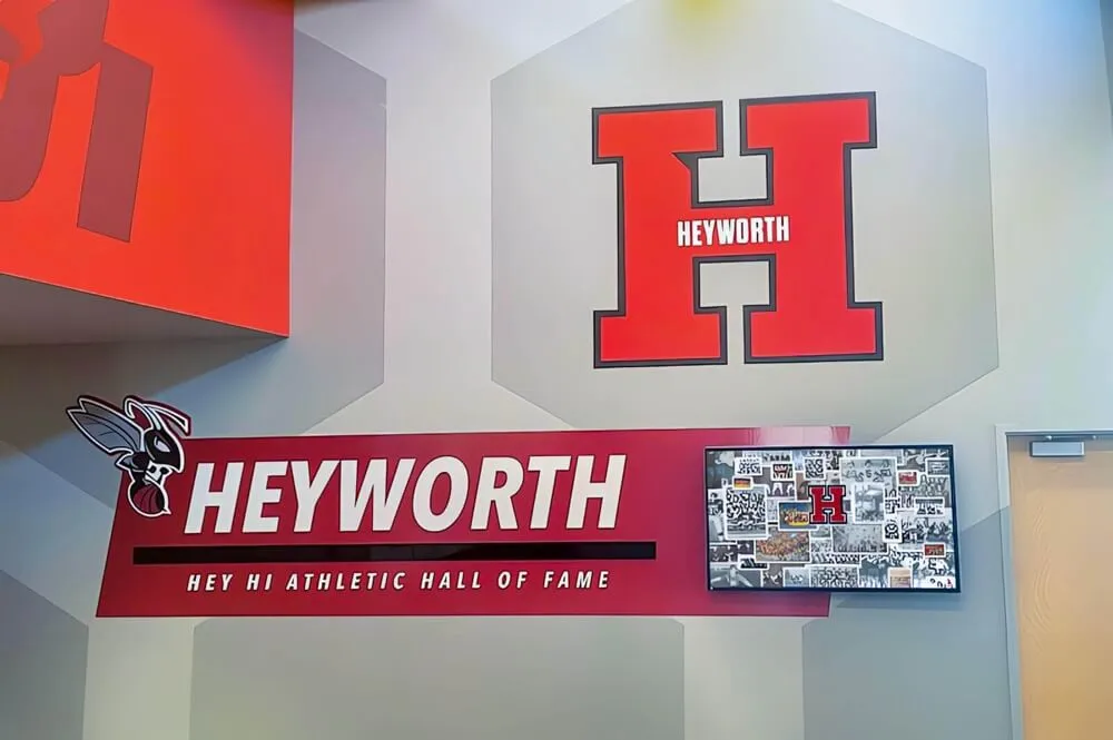 Heyworth athletic hall of fame wall sign with traditional recognition plaques Traditional athletic hall of fame wall