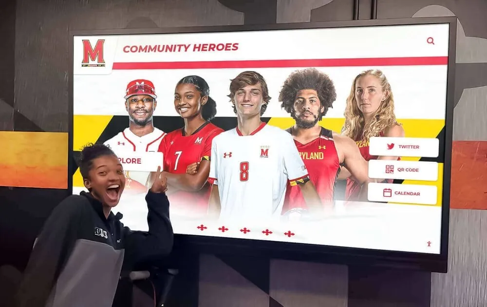 Students viewing interactive display